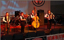 band Image on stage at shetland folk festival